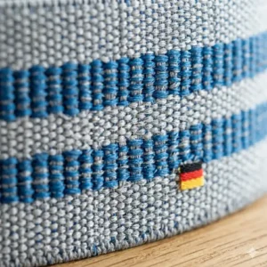 Detailed macro close-up view of the premium fabric texture and blue stripes on the stoff miniband premium